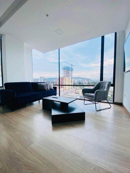 SUITE elegante, amoblada, sector la CAROLINA, cuarto piso, estacionamiento